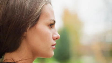 Portrait view lady face with visible goosebumps showing emotional reaction to Stock Footage 305812423