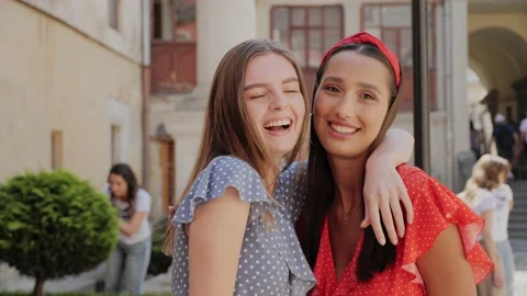 Portrait view of two best cheerful friends they having fun in urban street. Stock-Footage 138079482