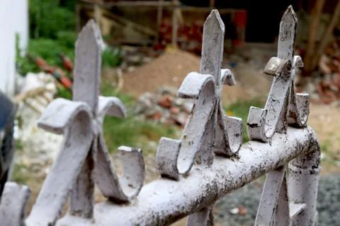 Portrait view of white rusty Swing Gates Stock Photos