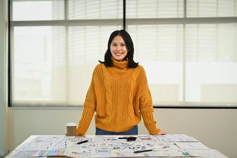 Portrait of web developer woman working on app design and user interface at Stock Photos