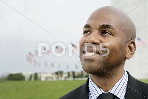 Portrait of a well dressed man smiling and looking away, Washington DC, USA Stock Photos