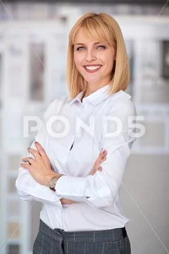 Portrait of woman business owner at office. Stock Photos