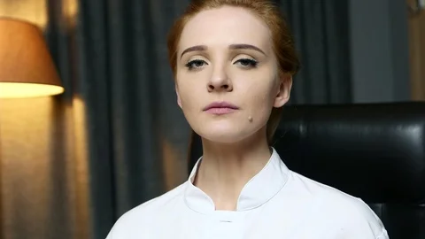 Portrait of woman computer IT engineer in goggles seriously looking at camera. Stockbeeldmateriaal 103717196