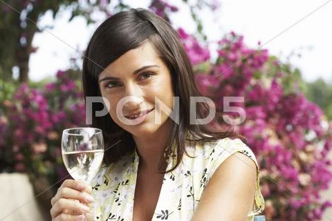 Portrait of Woman Holding Wine Glass Stock Photos
