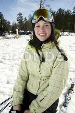 Portrait of woman skier at bottom of the hill Stock Photos