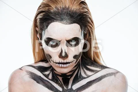 Portrait of woman with terrifying halloween makeup Stock Photos