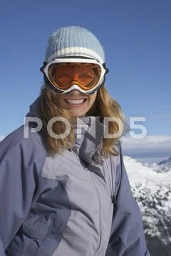 Portrait Of Woman At Top Of Ski Hill, Whistler, Bc, Canada