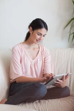 Portrait of a woman using a tablet computer Stock Photos