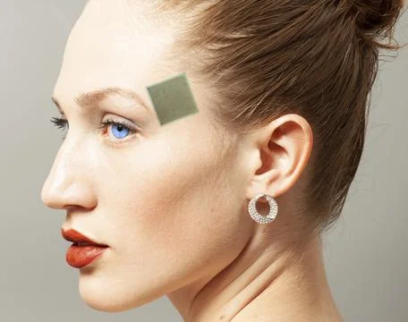 Portrait of woman's face with CPU processor microchip Stock Photos