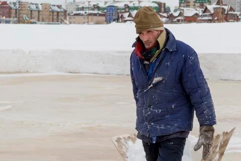 Portrait of a worker in a blue padded jacket 写真素材