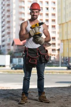 Portrait Of A Worker With Drill Stock Photos