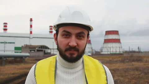 Portrait of worker - engineer at a thermal power plant. Power plant engineering Stock Footage 142859640