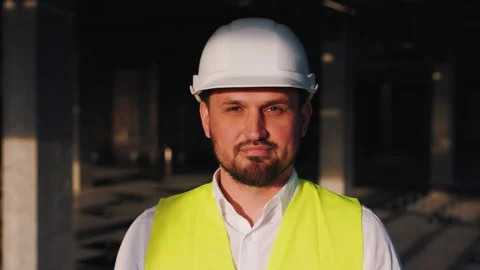 Portrait of Worker Man Engineer at Modern Unfinished Business Center. Male Civil Stock Footage 236043920