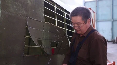 Portrait of a worker repairs powerful steam turbine. Stock Footage 81205870