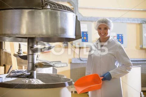 Portrait Of Worker Standing Next To Mixing Machine In Biscuit Factory Stock Images Page Everypixel