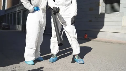 Portrait of workers in hazmat suits. time to protect yourself, stay at home. Stock Footage 137758710