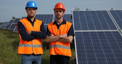 Portrait of Workers Team Looking Camera Posing Serious Look Row of Solar Panels Stock-Footage 88019608
