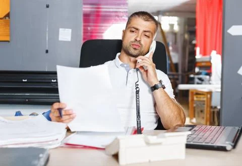 Portrait of a working man at printer studio Stock Photos