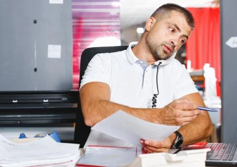 Portrait of a working man at printer studio Foto stock