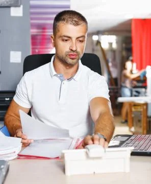 Portrait of a working man at printer studio Stock Photos