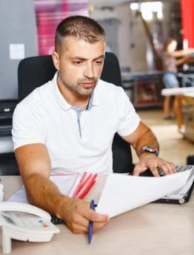Portrait of a working man at printer studio Stock Photos