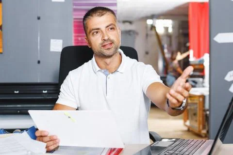 Portrait of a working man at printer studio Stock Photos