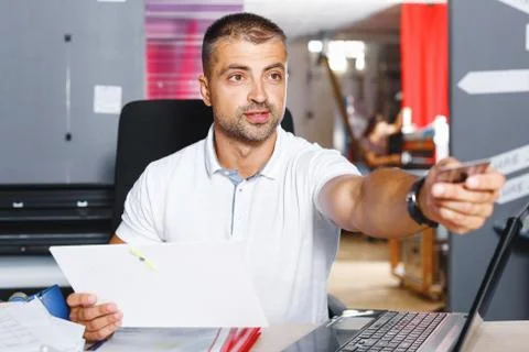 Portrait of a working man at printer studio Stock Photos