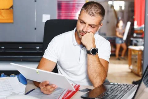 Portrait of a working man at printer studio Stock Photos