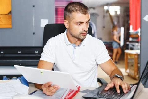 Portrait of a working man at printer studio Stock Photos