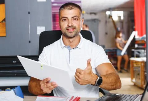 Portrait of a working man at printer studio Stock Photos
