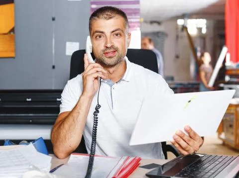 Portrait of a working man at printer studio Stock Photos