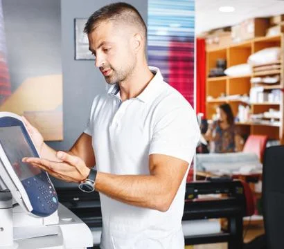 Portrait of a working man at printer studio Stock Photos