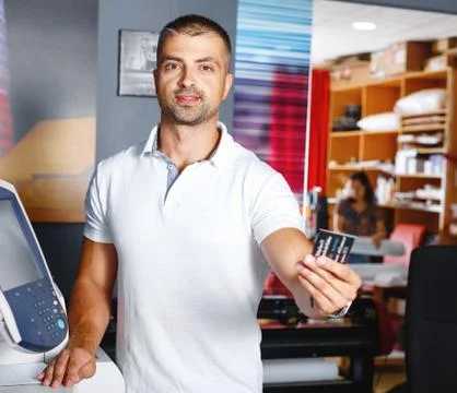 Portrait of a working man at printer studio Stock Photos
