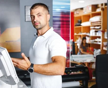 Portrait of a working man at printer studio Stock Photos