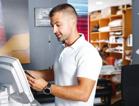 Portrait of a working man at printer studio Stock Photos