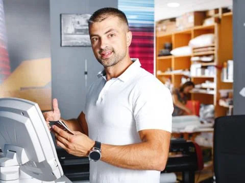 Portrait of a working man at printer studio Stock Photos