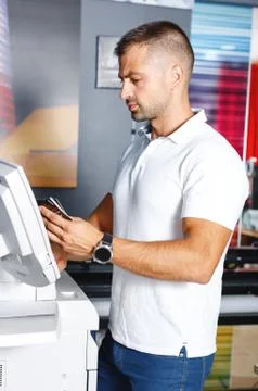 Portrait of a working man at printer studio Stock Photos