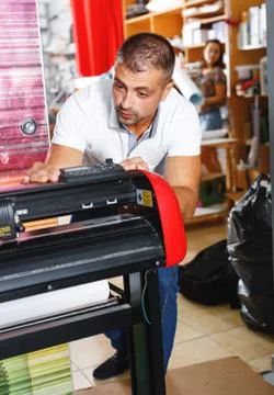 Portrait of a working man at printer studio Stock Photos