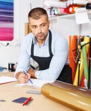 Portrait of a working man at printer studio Stock Photos