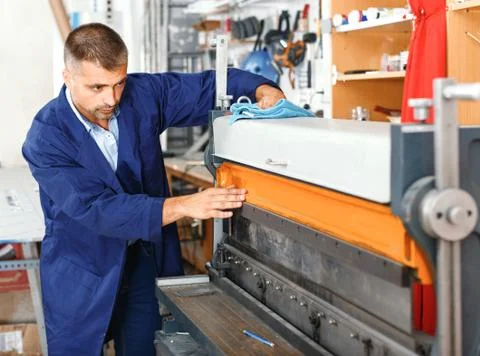 Portrait of a working man at printer studio Stock Photos