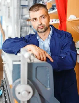 Portrait of a working man at printer studio Stock Photos