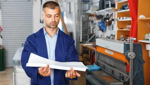 Portrait of a working man at printer studio Stock Photos