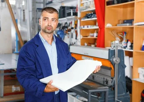 Portrait of a working man at printer studio Stock Photos