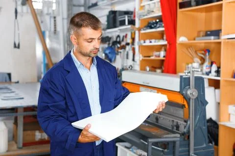 Portrait of a working man at printer studio Stock Photos