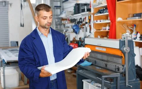 Portrait of a working man at printer studio Stock Photos