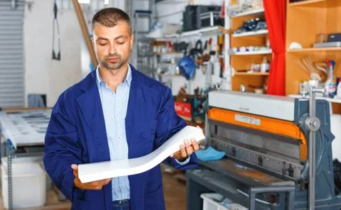 Portrait of a working man at printer studio Stock Photos