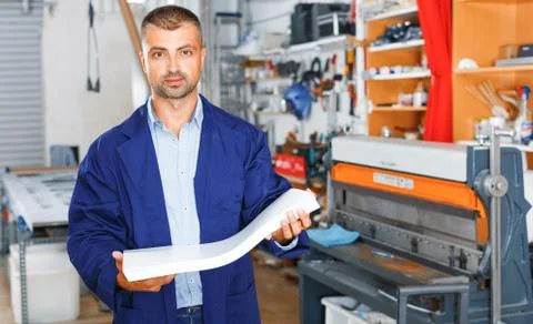 Portrait of a working man at printer studio Stock Photos