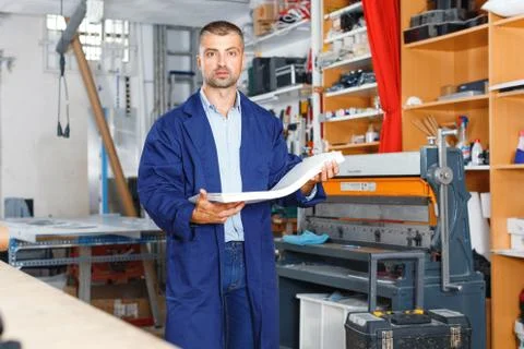 Portrait of a working man at printer studio Stock Photos