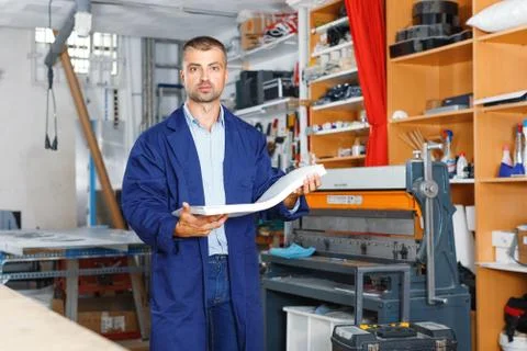 Portrait of a working man at printer studio Stock Photos