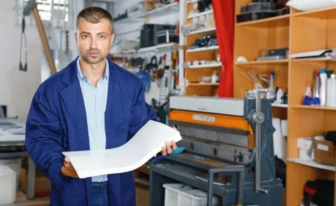 Portrait of a working man at printer studio Stock Photos